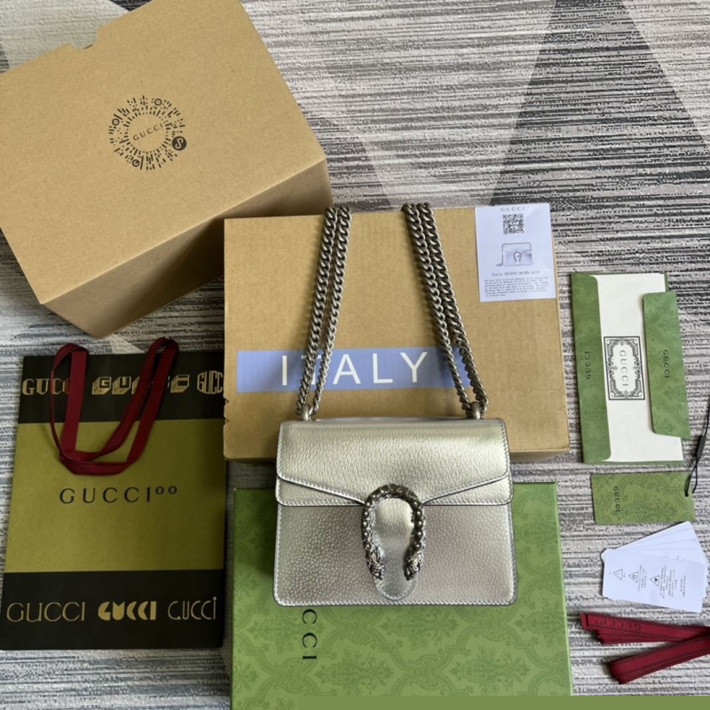 G*u*i top handle bags